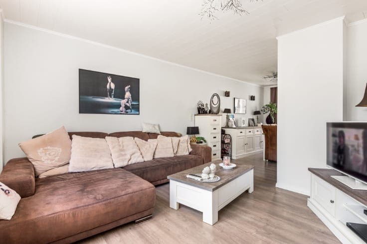 Zeer gunstig gelegen woning met 3 SLK en gezellig koertje