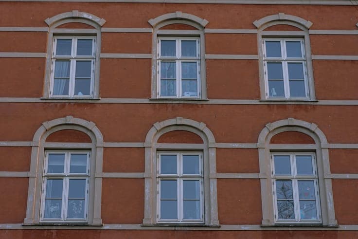 A 7-story property with 3 retail units and 23 apartments