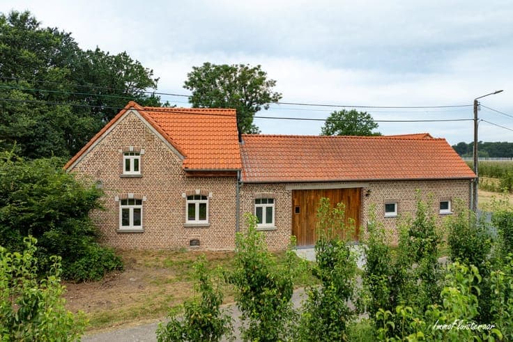 Charming renovated home with stable building on approximate