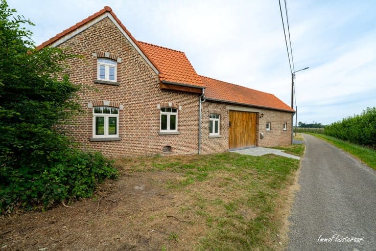 Charming renovated home with stable building on approximate