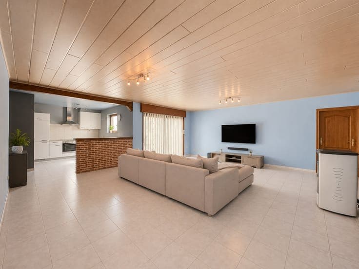 Te koop, Uiterst ruime kangoeroewoning met garage en tuin...