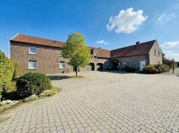 Unique farmhouse with residence, 3 apartments, and horse st