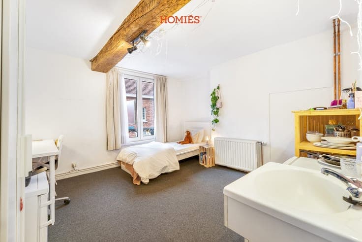 Welgelegen gebouw met 7 studentenkamers