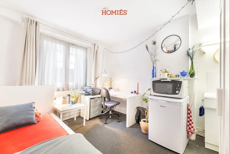 Welgelegen gebouw met 7 studentenkamers