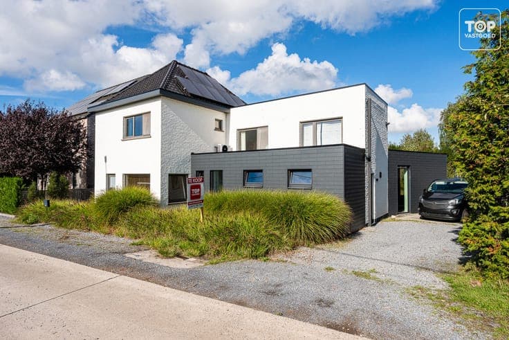 Woning met grote tuin en magazijn/loods, ideaal voor zelfsta