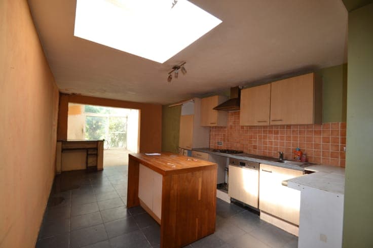 Te renoveren woning met tuin en tal van mogelijkheden aan...