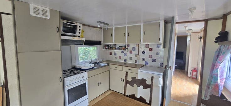 Residential caravan with land and pond view