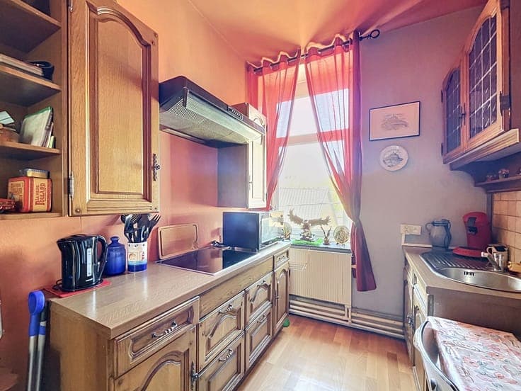 INVEST - 2 APPT + LOGEMENT COLLECTIF (5 UNITÉS) + GARAGE