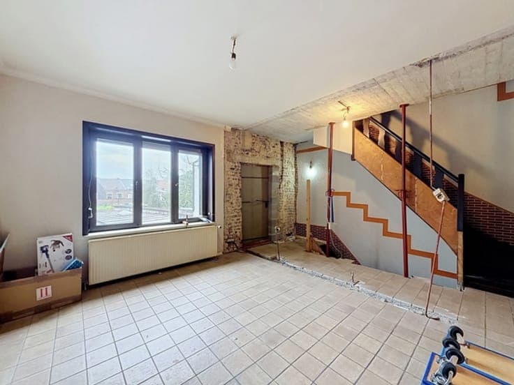 Maison de commerce offrant de nombreuses possibilités