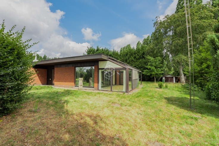 Centraal gelegen gelijkvloerse woning met royale tuin op ...