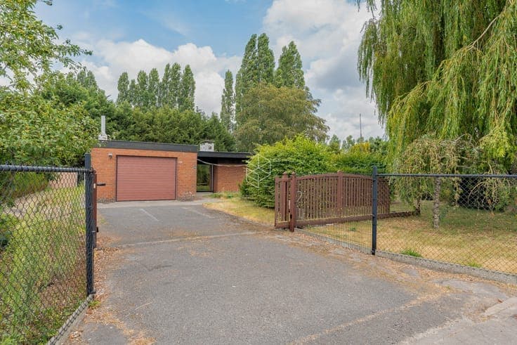 Centraal gelegen gelijkvloerse woning met royale tuin op ...