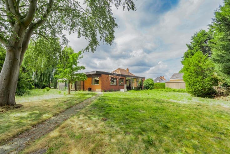 Centraal gelegen gelijkvloerse woning met royale tuin op ...