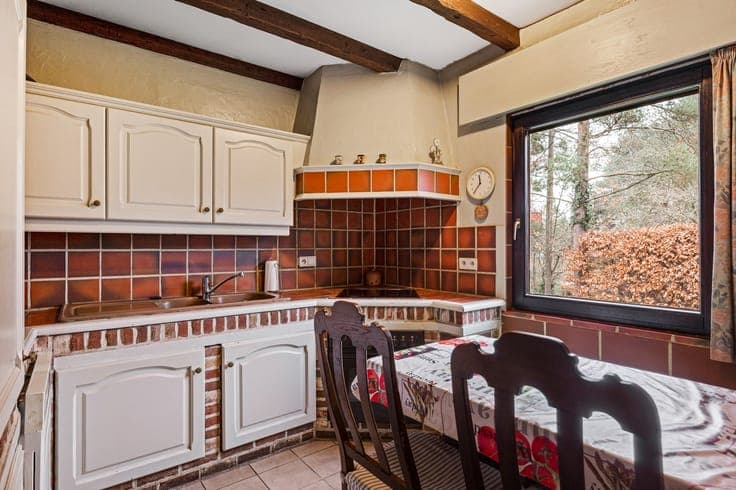 Vastgoedportefeuille met verscheidende woningen en gronde...