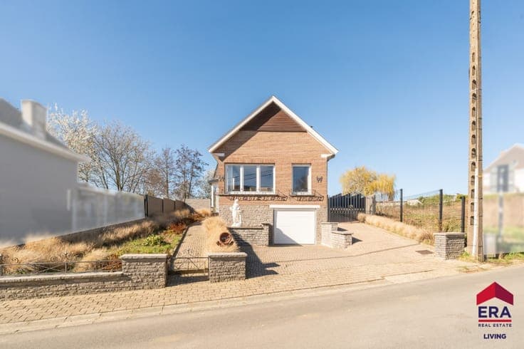 Home to modernise with garage, garden and open green view