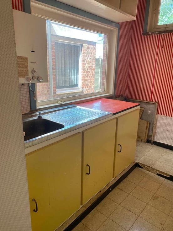 Centraal gelegen woning met tuin en ruime inrichtbare zolder