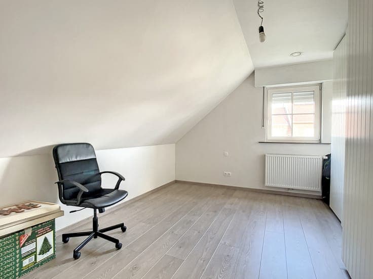 Zongerichte woning met tuin te Adindkerke.