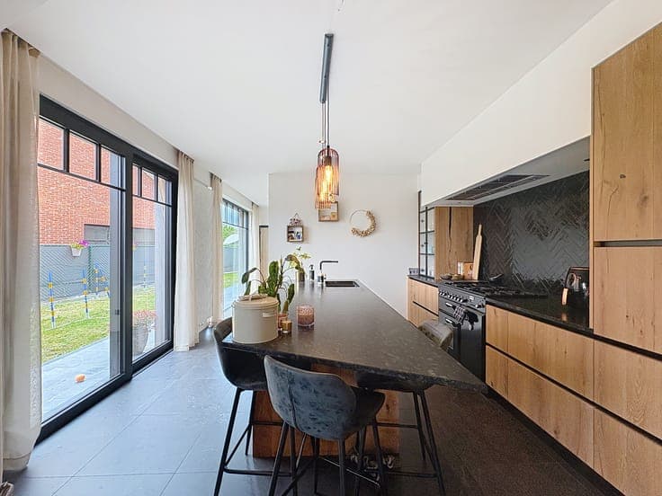 Bright home with open kitchen for sale in Waasmunster