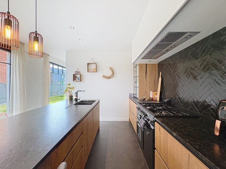 Bright home with open kitchen for sale in Waasmunster