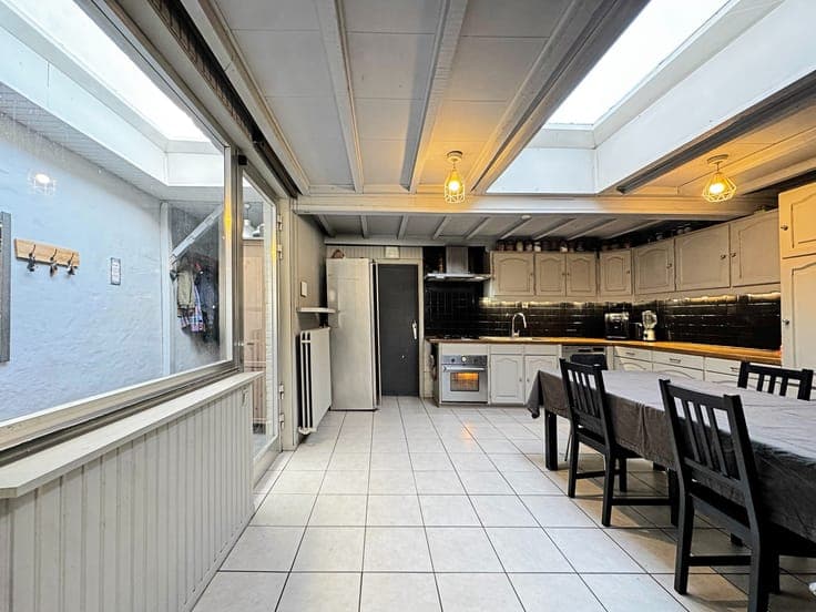 Rijwoning met 3 slaapkamers, zonnige tuin en garage vlakb...