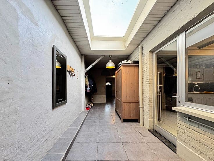 Rijwoning met 3 slaapkamers, zonnige tuin en garage vlakb...