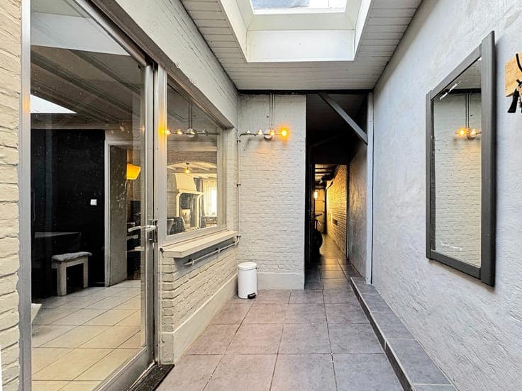 Rijwoning met 3 slaapkamers, zonnige tuin en garage vlakb...