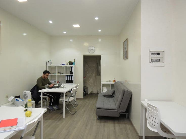 Investment house ; a commercial space + a residential unit.