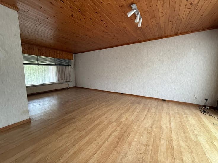 3-bedroom house with a garage and spacious outdoor area