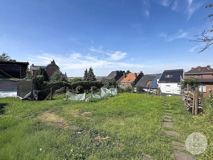 🏡 Pépite à Visé : 4 chambres + 4 garages en plein centre !