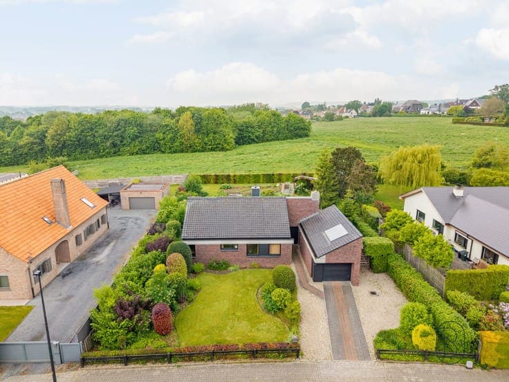 Spacious detached four-sided home with 3 bedrooms.