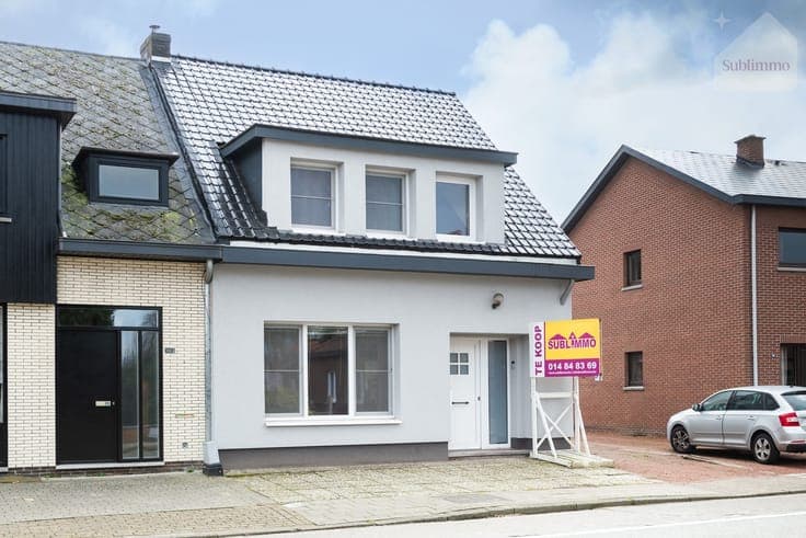 Halfopen bebouwing met 3 slaapkamers en ruime tuin (1.147...