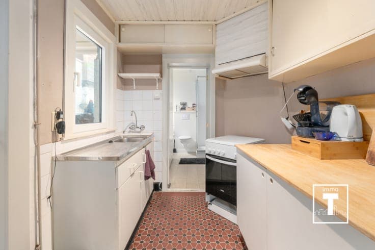 Gezellige rijwoning met terras op interessante ligging!