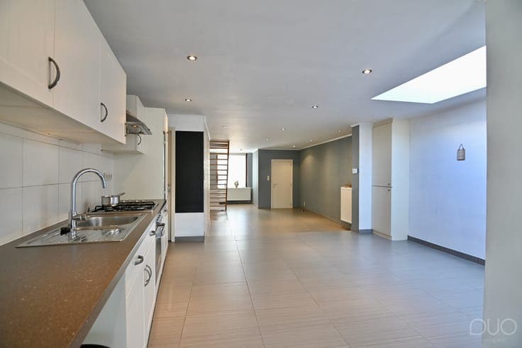 Instapklare rijwoning met west geörienteerde buitenruimte