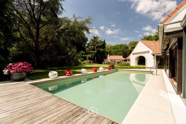 Green-surrounded farmhouse