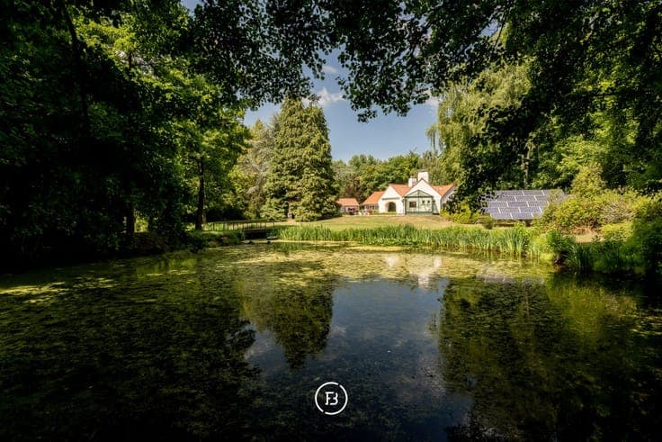 Green-surrounded farmhouse