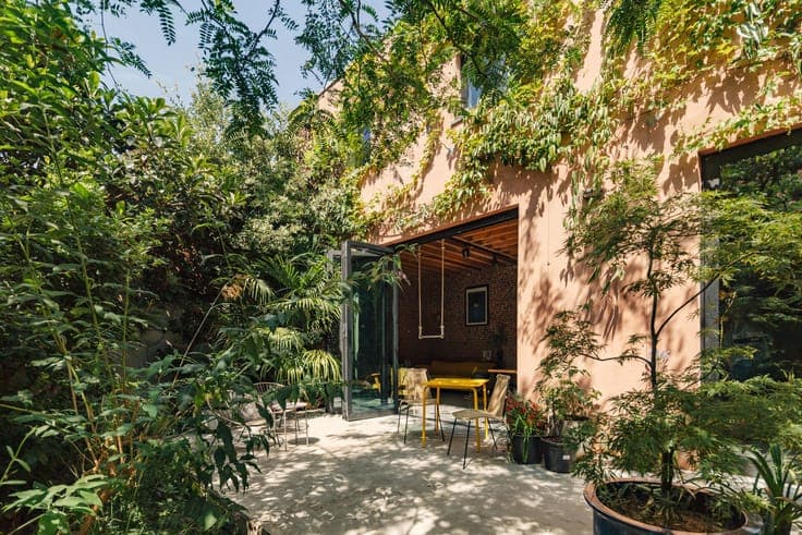 A versatile complex comprising 3 homes with a lush garden