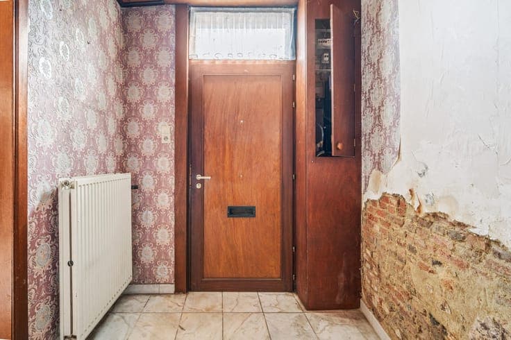 Te renoveren woning met tuin in centrum Westmeerbeek