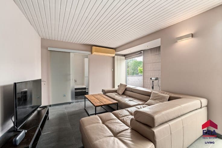 Versatile home (272 m²) with commercial space in Erembodegem