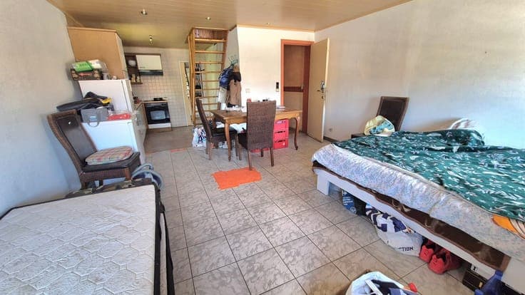 Alleenstaande op te frissen woning op een groot perceel g...