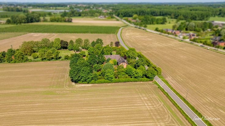 Uniquely located to renovate house with stable building on
