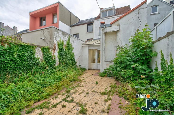 A family home in need of some updating, with a sunny cour...