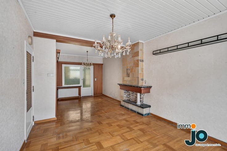 A family home in need of some updating, with a sunny cour...