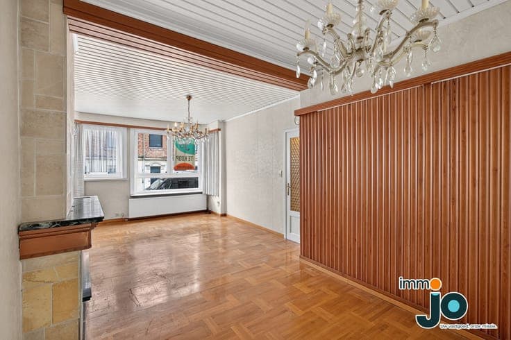 A family home in need of some updating, with a sunny cour...