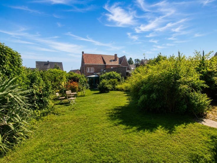 Charmante halfopen bebouwing met diepe tuin op rustige li...