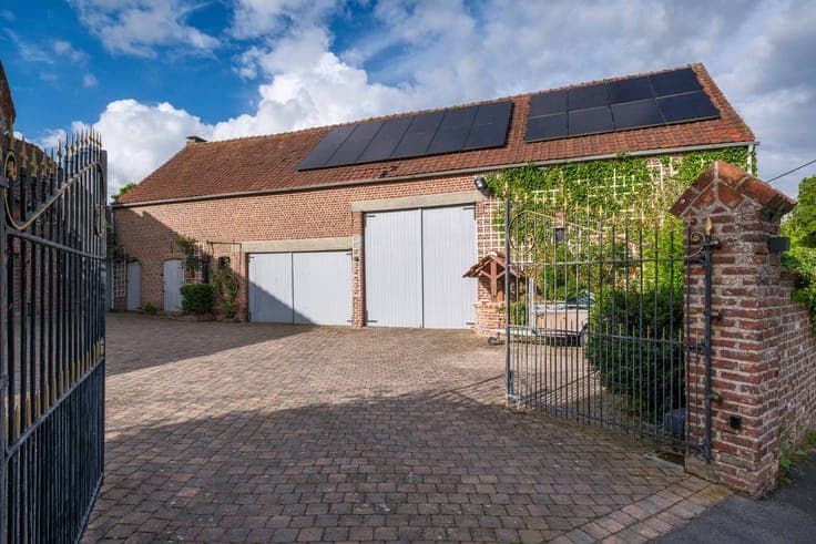 Renovated house for sale with a large shed in Lierde