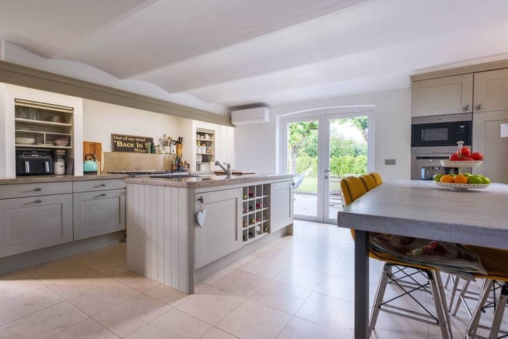 Renovated house for sale with a large shed in Lierde