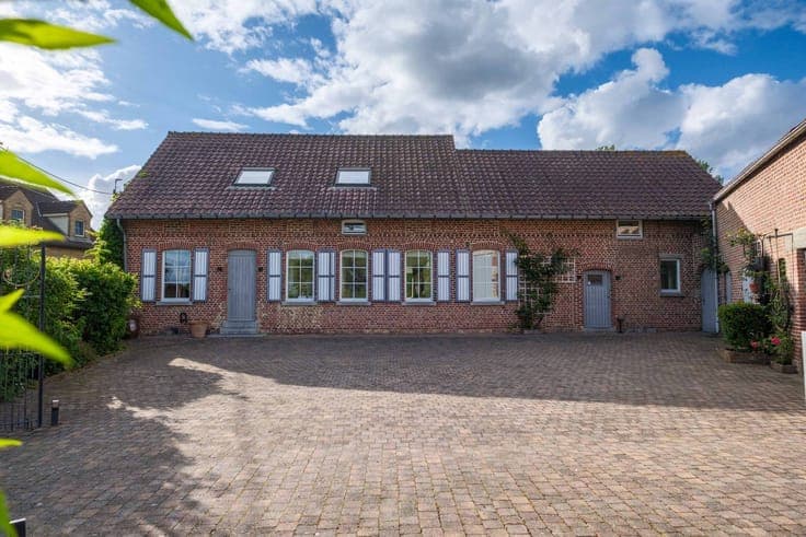 Renovated house for sale with a large shed in Lierde