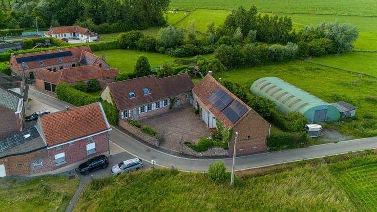 Renovated house for sale with a large shed in Lierde