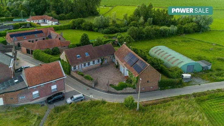 Renovated house for sale with a large shed in Lierde