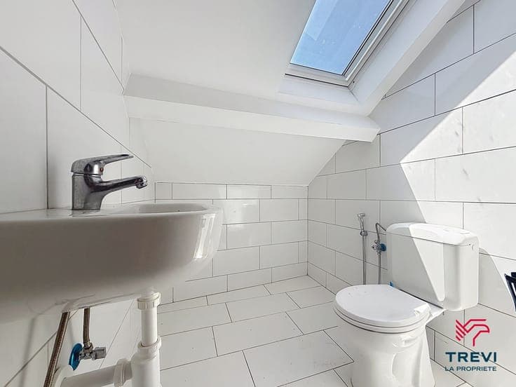 IMMEUBLE COMPRENANT 3 LOGEMENTS