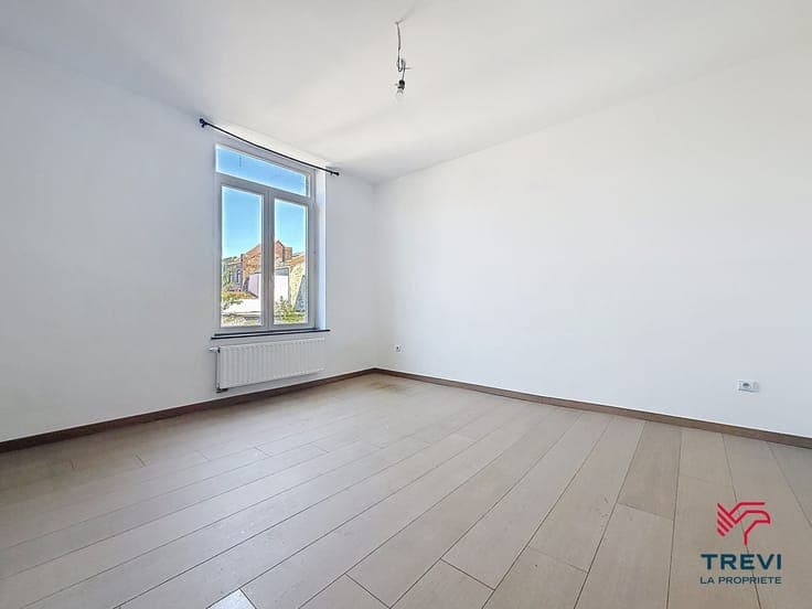 IMMEUBLE COMPRENANT 3 LOGEMENTS